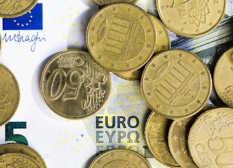 Image showing five Euro with coins