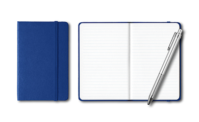Image showing Marine blue closed and open notebooks with a pen isolated on whi