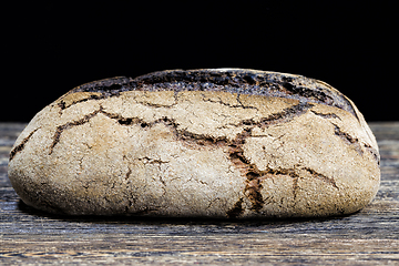 Image showing black homemade rye flour bread