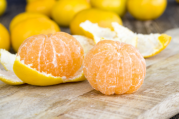 Image showing peeled orange tangerines
