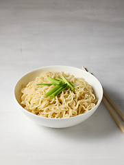 Image showing bowl of boiled noodles and chopsticks