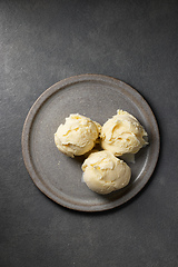 Image showing three ice cream balls on grey plate