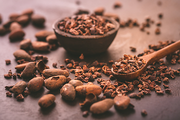 Image showing Organic cacao beans and nibs in small bowl 