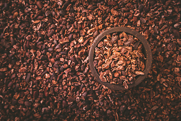 Image showing Organic cacao nibs in small bowl 