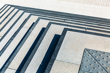 Image showing Sunlight and shadow on wide stone staircase. Abstract theme.