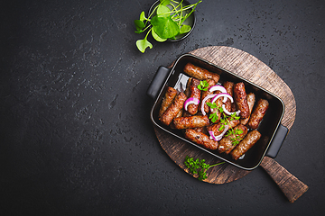Image showing Traditional south european skinless sausages cevapcici made of ground meat and spices