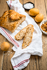 Image showing Homemade oven baked bread with carrots and onions