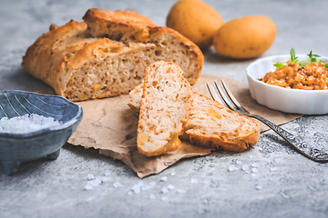 Image showing Homemade oven baked bread with carrots and onions