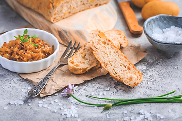 Image showing Homemade oven baked bread with carrots and onions