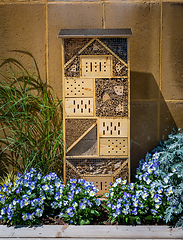 Image showing Insect hotel made, bug house made from different materials to offer protection and nesting aid