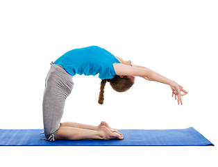 Image showing Yoga - young beautiful woman doing yoga asana excerise isolated