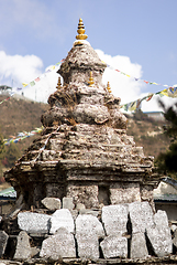 Image showing Buddhism stupa or chorten with prayer flags in Himalayas