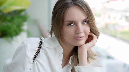 Image showing Elegant Caucasian Woman with Positive Smile Looking at Camera