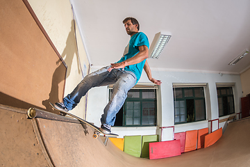 Image showing Skateboarder performing a trick