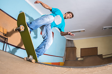 Image showing Skateboarder performing a trick