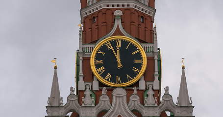 Image showing Moscow Kremlin Main Clock named Kuranti on Spasskaya Tower 12 hours . Red Square.