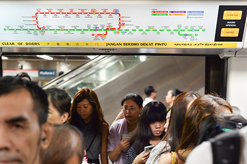 Image showing Passengers boarding metro train, Singapore