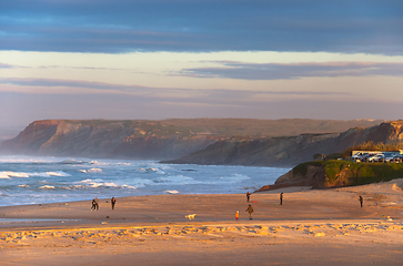 Image showing People walking ocean beach Portugal