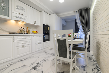 Image showing White kitchen in classic style just before the Christmas