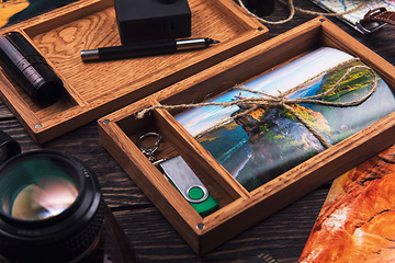 Image showing Wooden photo box with photo from travel