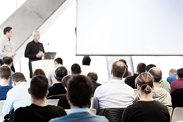 Image showing Male speeker having talk at public event.