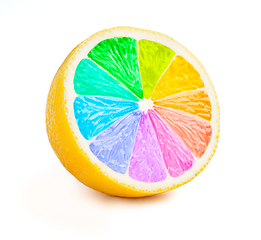 Image showing Lemon cut half slice with color wheel isolated