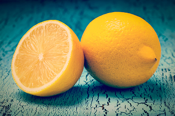 Image showing Lemon and cut half slice