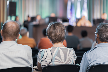 Image showing Speaker Giving a Talk at Business Meeting. Audience in the conference hall. Business and Entrepreneurship