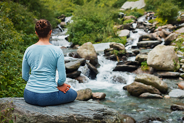 Image showing Woman in Padmasana outdoors