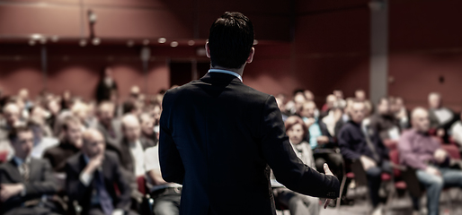 Image showing Public speaker giving talk at business event.