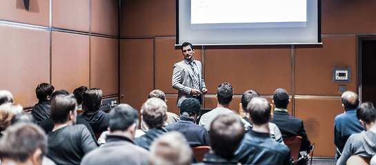 Image showing Business speaker giving a talk at business conference meeting event.