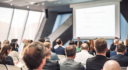 Image showing Round table discussion at business conference meeting event.. Audience at the conference hall. Business and entrepreneurship symposium.