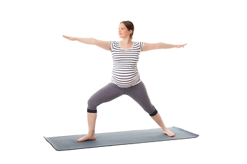 Image showing Pregnant woman doing yoga asana Virabhadrasana 2