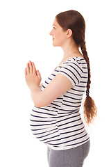 Image showing Pregnant woman doing yoga asana asana Tadasana namaste -Mountain pose with salutation