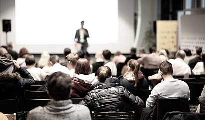 Image showing Business speaker giving a talk at business conference event.