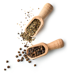 Image showing whole and ground pepper