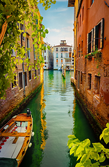 Image showing Boat in a narrow channel