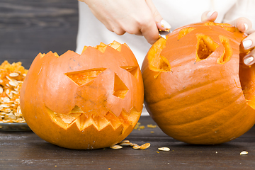 Image showing preparing a scary orange pumpkin lamp