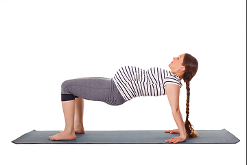 Image showing Pregnant woman doing yoga asana Purvottanasana