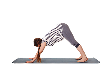 Image showing Pregnant woman doing yoga asana Adho mukha svanasana