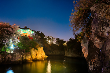 Image showing Yongyeon Pond with Yongyeon Pavilion illuminated at night, Jeju islands, South Korea