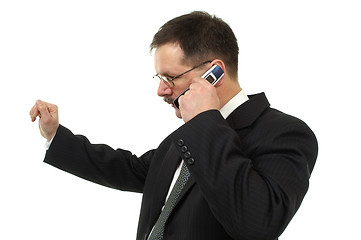 Image showing  Businessmanit speaks by mobile phone