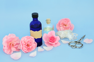 Image showing Rose Flower Aromatherapy Essential Oil with Pink Roses 