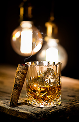 Image showing Cigar and glass with whiskey