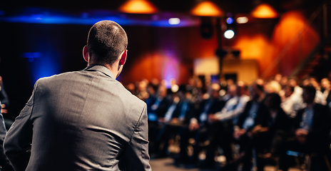 Image showing Public speaker giving talk at Business Event.