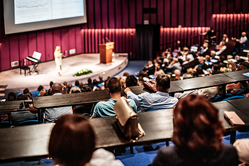 Image showing Woman giving presentation on business conference event.