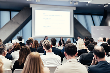 Image showing Round table discussion at business conference meeting event.. Audience at the conference hall. Business and entrepreneurship symposium.