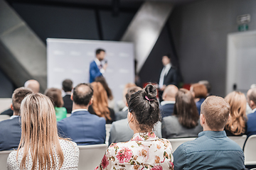 Image showing Pitch presentation and project discussion at business convention or team meeting. Audience at the conference hall. Business and entrepreneurship symposium.