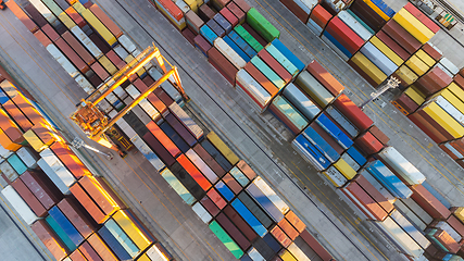 Image showing Aerial view of shipping container port terminal. Colourful pattern of containers in harbor. Maritime logistics global inport export trade transportation.