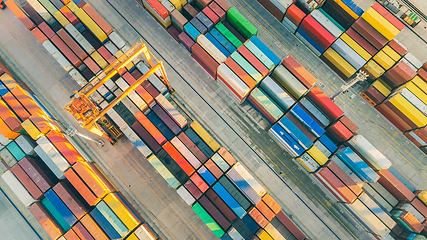 Image showing Aerial view of shipping container port terminal. Colourful pattern of containers in harbor. Maritime logistics global inport export trade transportation.